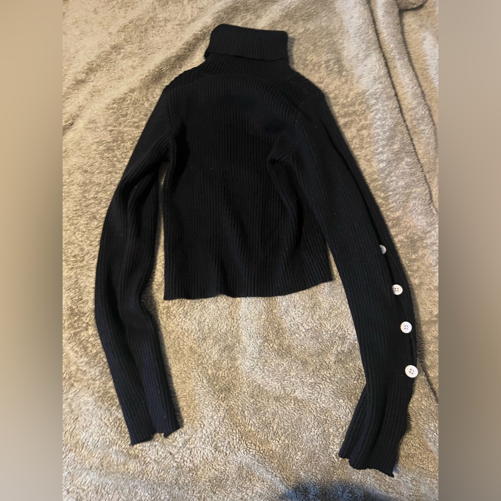 Soft Black Turtleneck with Button Details on Sleeve